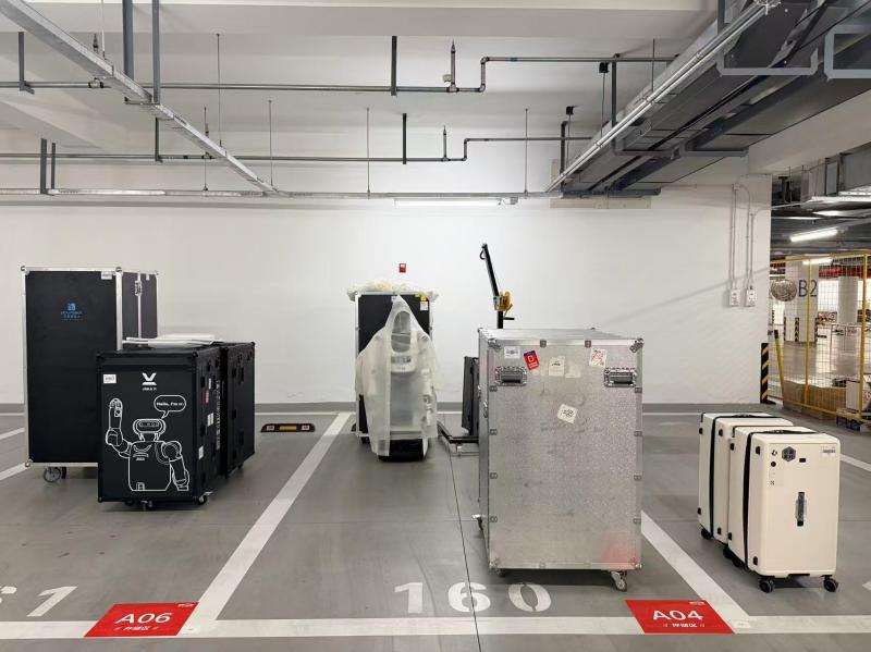 备齐仓储、修理、充电功能，上千台机器人入驻“运动员村” | 机器人发展看北京